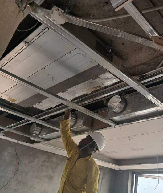 Engineer inspecting an industrial cooling system