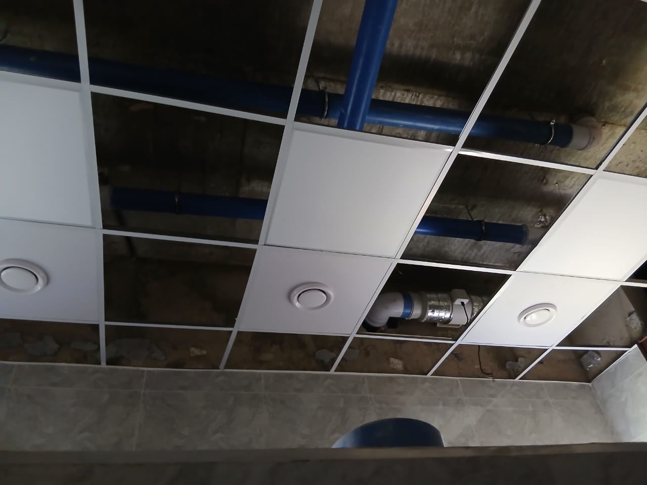 Certified technicians installing HVAC equipment