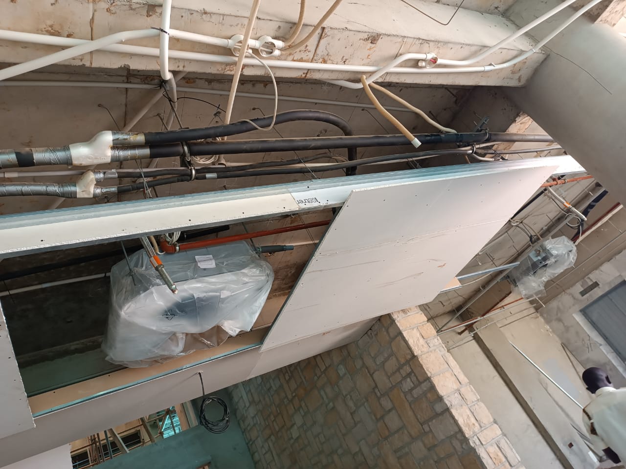 Three Daikin outdoor units on a residence wall